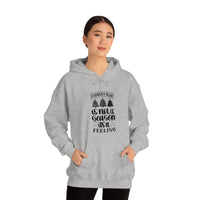 Christmas is not a Season it's a Feeling Unisex Heavy Blend Hooded Sweatshirt! Winter Vibes!