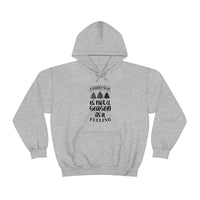 Christmas is not a Season it's a Feeling Unisex Heavy Blend Hooded Sweatshirt! Winter Vibes!